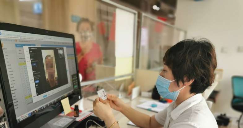 哈尔滨公证处远程视频在线公证为在美华侨解难题